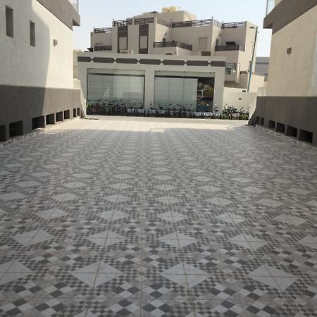 The Diamonds Apartment Al Khiran Bagian luar foto