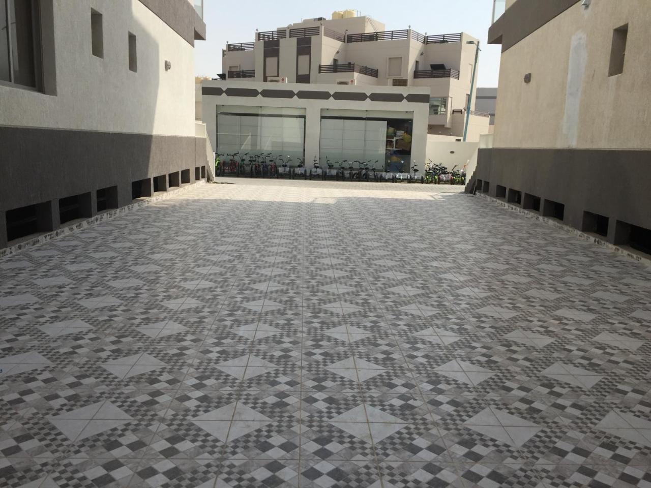 The Diamonds Apartment Al Khiran Bagian luar foto