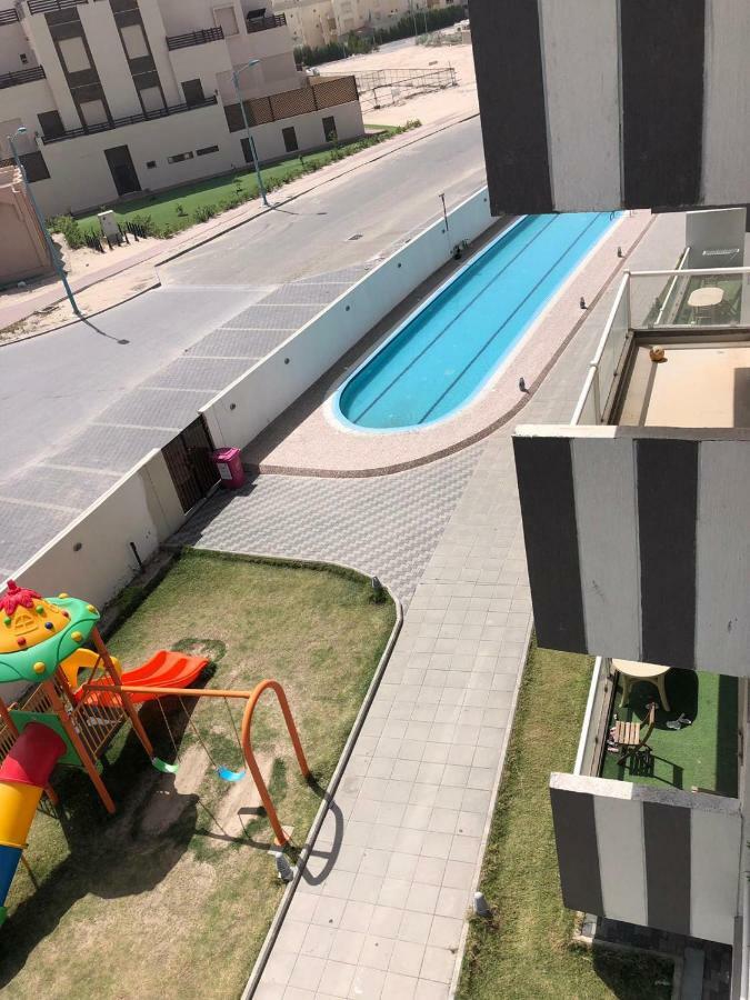 The Diamonds Apartment Al Khiran Bagian luar foto